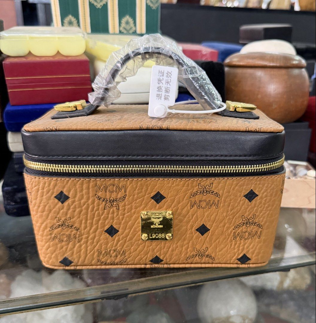 MCM Vanity Case Bag Monogram Brown Leather (Category: Luxury Bags & Wallets) located in Quezon City. Submitted by megchrisanne (Listing ID 1439933863, Image 1). Description: Stylish MCM vanity case in monogram Korea Source With strap First to pay Bdo/Gcash payment LBC/Lalamove Courier .