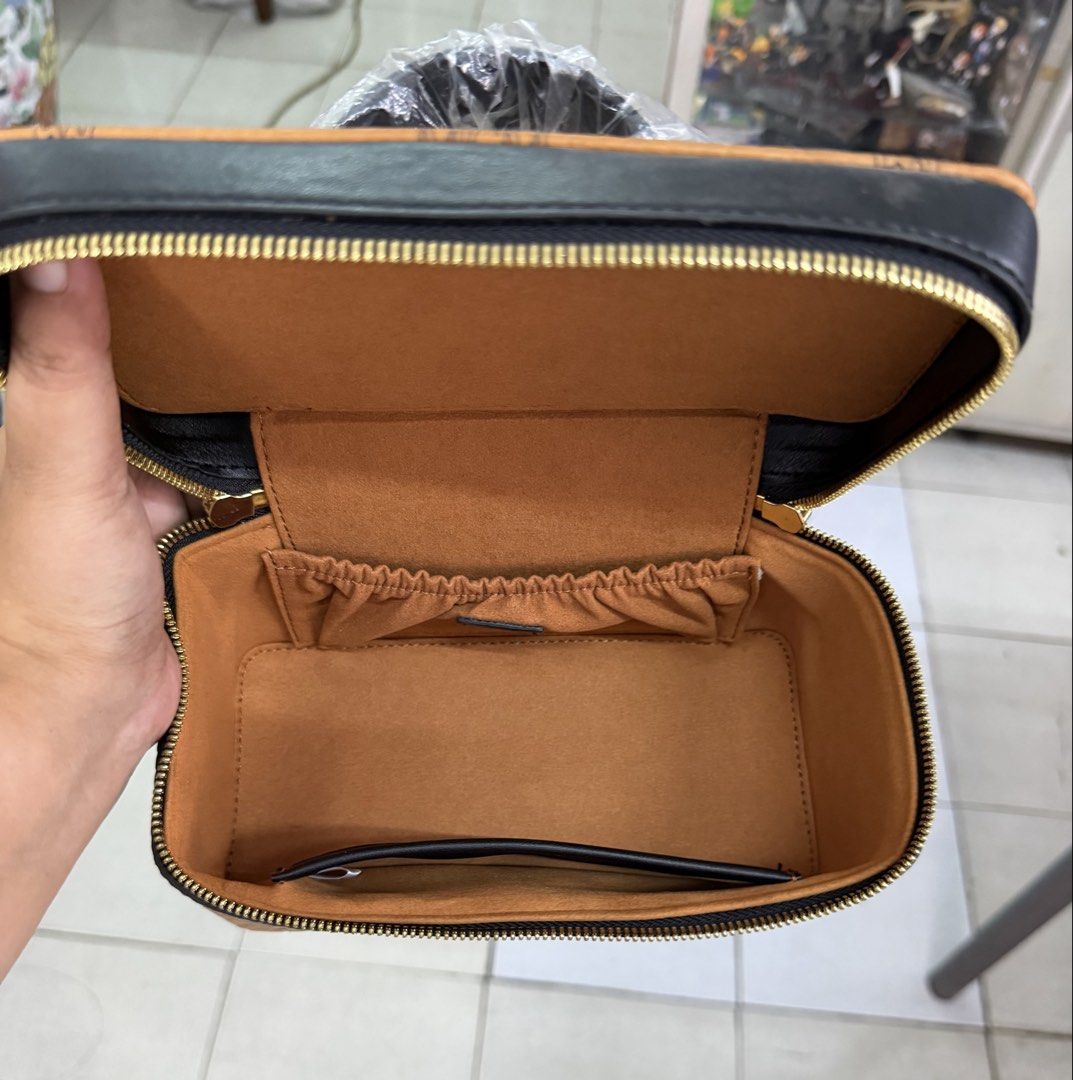 MCM Vanity Case Bag Monogram Brown Leather (Category: Luxury Bags & Wallets) located in Quezon City. Submitted by megchrisanne (Listing ID 1439933863, Image 3). Description: Stylish MCM vanity case in monogram Korea Source With strap First to pay Bdo/Gcash payment LBC/Lalamove Courier .