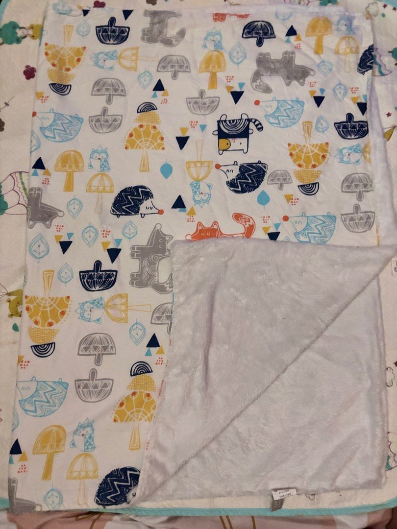 Mink Baby Blanket (Category: Bed Guards) located in Manila. Submitted by elainejoy047451 (Listing ID 1439946905, Image 1). Description: - Adorable woodland theme with hedgehogs, foxes, cats, and mushrooms. - Soft, plush white material on one side for ultimate comfort. - Versatile use: great for tummy time, stroller rides, or cozy naps. - Perfect for keeping your little one warm and snug..