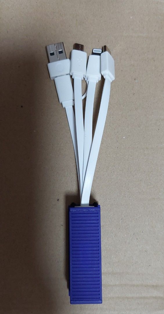 Multi-Port USB Charging Cable (Category: Chargers & Cables) located in Singapore. Submitted by pappy (Listing ID 1439917195, Image 1). Description: - Charge multiple devices simultaneously with one cable. - Features USB-C, Micro USB, and Lightning connectors, etc - Compact and portable. - Convenient for travelling..