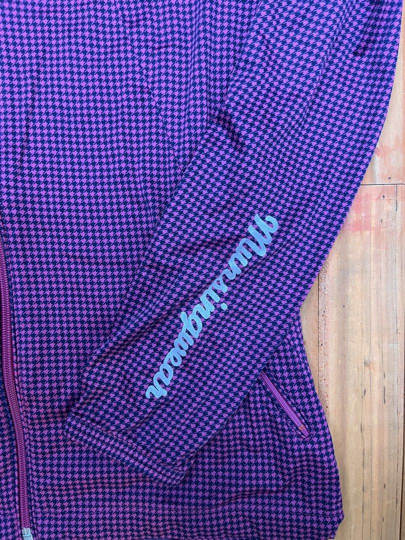 Munsingwear Purple Houndstooth Full Zip Hooded Jacket (Category: Coats, Jackets and Outerwear) located in Manila. Submitted by homegrwn_thrift (Listing ID 1439916463, Image 3). Description: - Munsingwear hooded jacket - Classic purple and navy houndstooth pattern - Full zip front closure - Adjustable drawstring hood Size: Medium Gcash Payment Loc: Sjdm Bulacan.