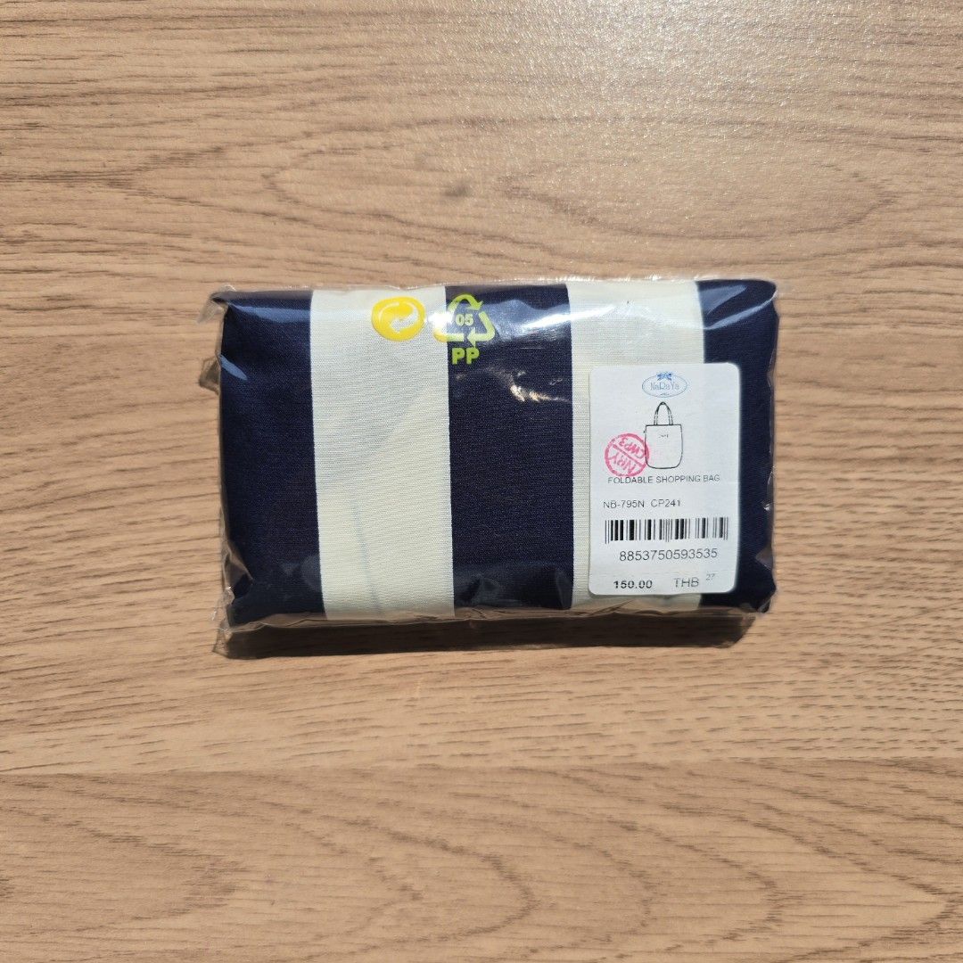 NaRaYa Foldable Shopping Bag (Category: Tote Bags) located in Quezon City. Submitted by declutterwithnic (Listing ID 1439866140, Image 2). Description: - NaRaYa foldable shopping bag - Navy and white stripes - Brand new, in original packaging .