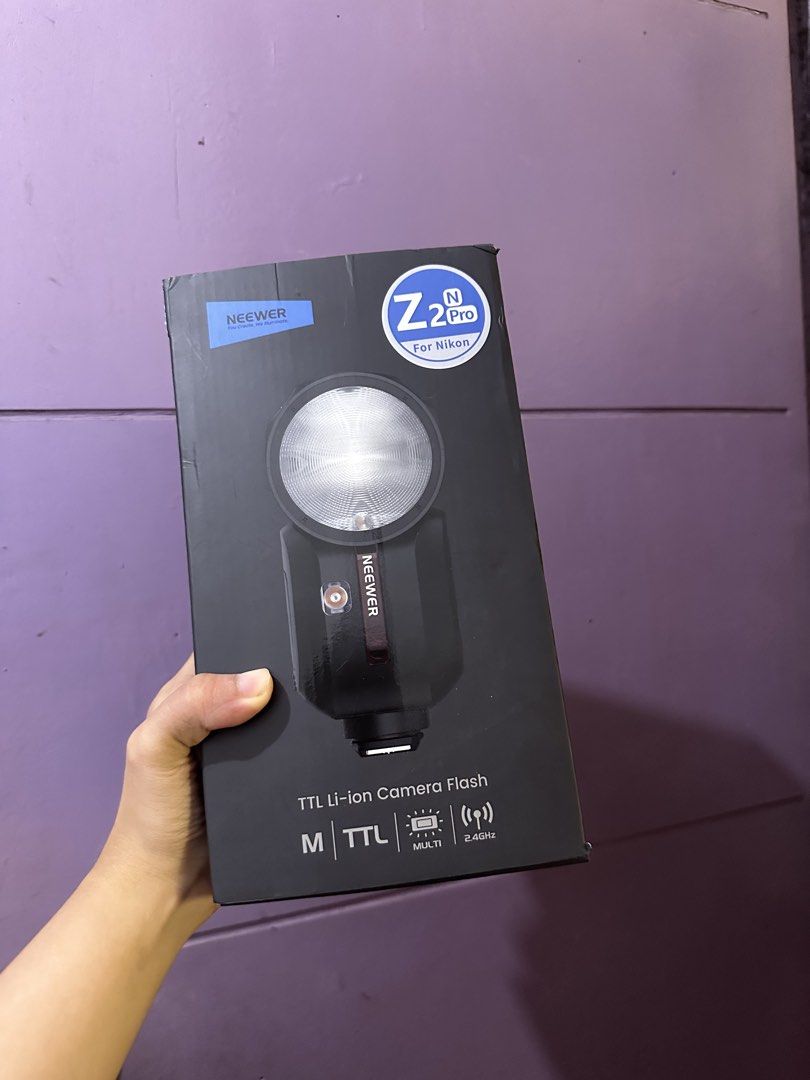 Neewer Z2-S Pro TTL Li-ion Camera Flash (Category: Flashes) located in Manila. Submitted by chandlerjoey73 (Listing ID 1439887052, Image 2). Description: Once lang nagamit - Neewer Z2-S Pro TTL Flash for Nikon cameras. - Includes: Flash unit, battery, charger, mini USB cable, and protective pouch. - Built-in LED modeling light. - Supports 2.4G wireless transmission..