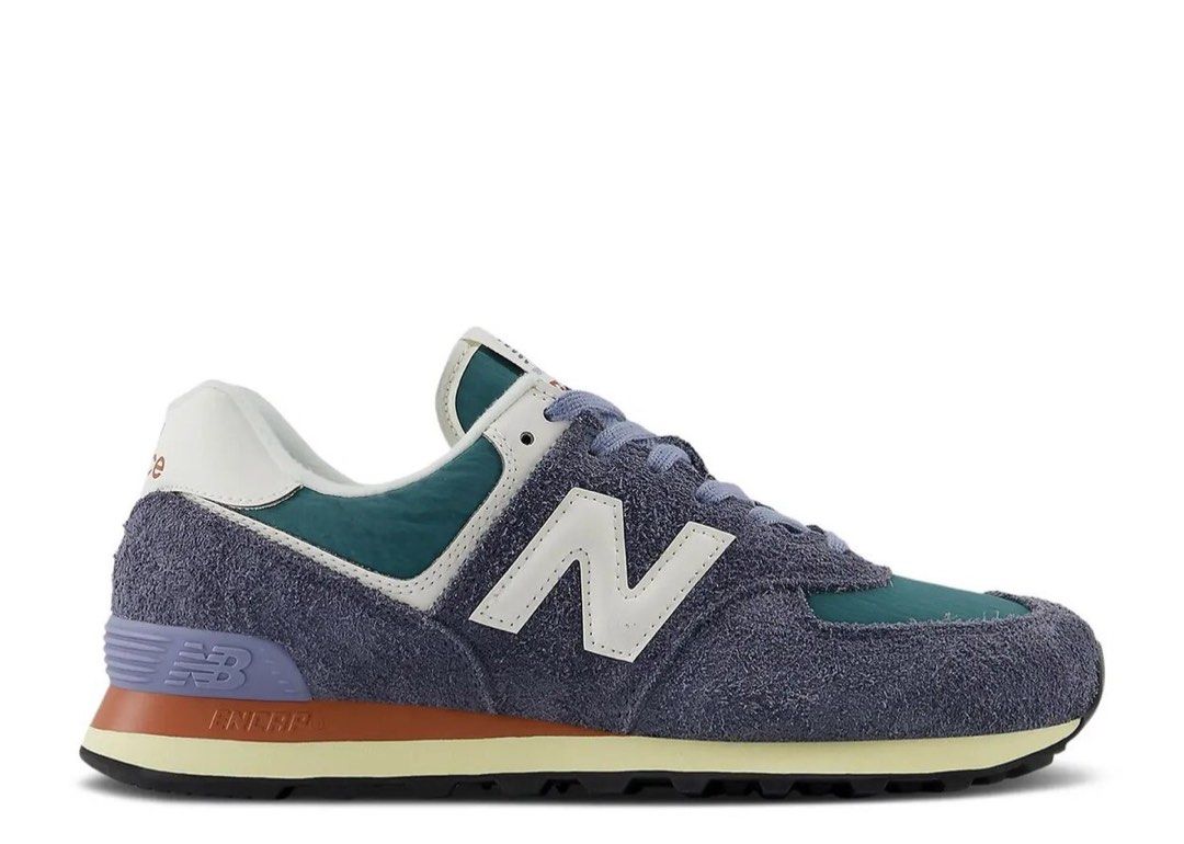 New Balance 574 Sneakers (Category: Sneakers) located in Manila. Submitted by ejnicolasd26677 (Listing ID 1439818298, Image 2). Description: - New Balance 574 sneakers - Blue suede upper - Teal and white accents - Cream midsole - Black outsole - Iconic 'N' logo on sides - New Balance and '574' branding on tongue.
