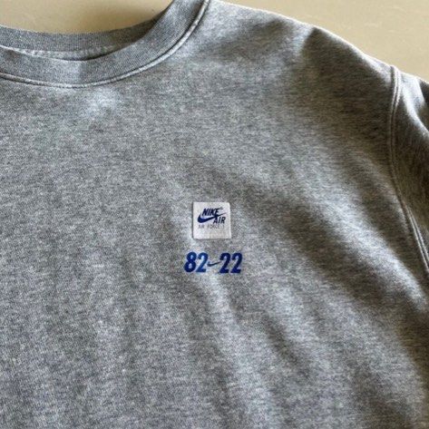 Nike Air Force 1 Crewneck Sweatshirt Grey XXL (Category: Coats, Jackets and Outerwear) located in Singapore. Submitted by ashlqykk (Listing ID 1439933774, Image 3). Description: - Grey Nike Air Force 1 crewneck sweatshirt - Size: XXL - Back graphic: Globe with Nike swoosh and 'Air Force 1' text - Front detail: Small Nike Air logo and '82-22' - Ideal for casual wear.
