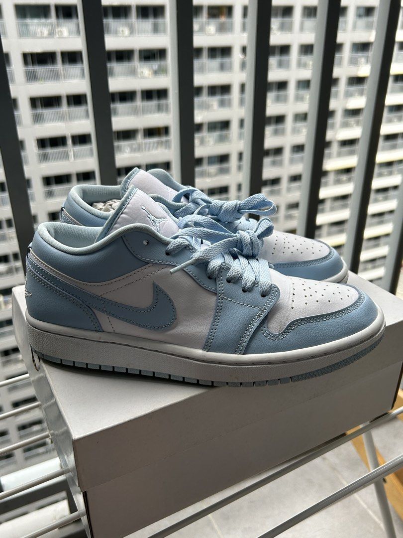 Nike Air Jordan 1 Low (Category: Sneakers) located in Manila. Submitted by prelovedbykl7 (Listing ID 1439902654, Image 1). Description: - Authentic Nike Air Jordan 1 Low - Colorway: White/Ice Blue - Classic low-top silhouette - Made with leather and textile materials - Includes original box and tissue paper - Ideal for everyday wear and sneaker collectors.