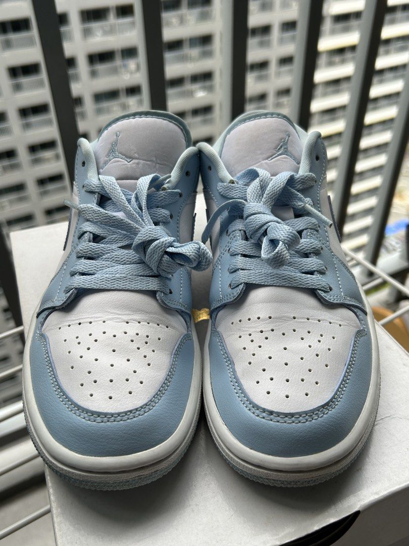 Nike Air Jordan 1 Low (Category: Sneakers) located in Manila. Submitted by prelovedbykl7 (Listing ID 1439902654, Image 2). Description: - Authentic Nike Air Jordan 1 Low - Colorway: White/Ice Blue - Classic low-top silhouette - Made with leather and textile materials - Includes original box and tissue paper - Ideal for everyday wear and sneaker collectors.