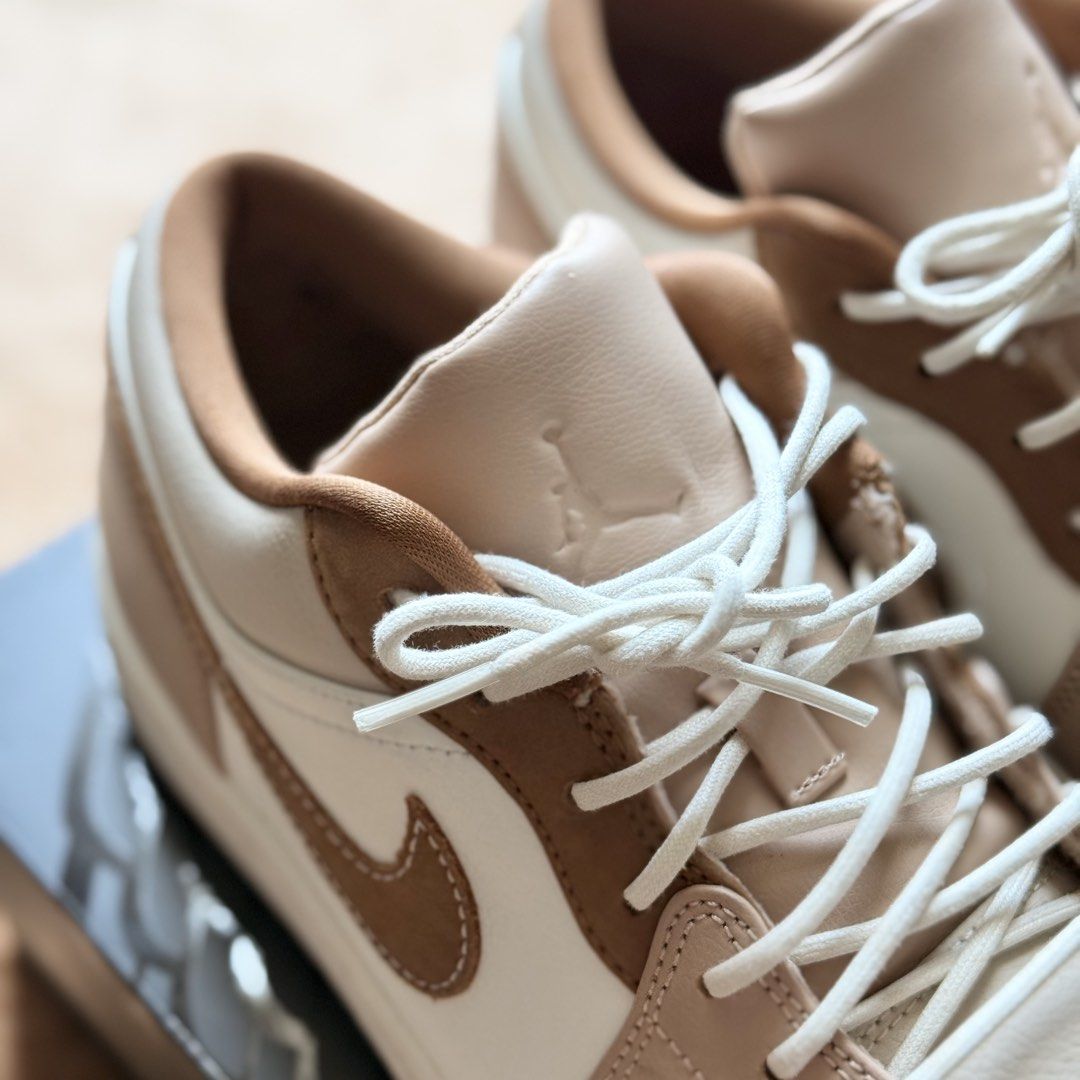 Nike Air Jordan 1 Low SE (Category: Sneakers) located in Taguig. Submitted by apartment.twentyseven (Listing ID 1439968464, Image 3). Description: Nike Air Jordan 1 Low SE “Hemp Light British Tan” Size: 10 US Condition: lighty used / Complete with box, papers and shoe tree. Price: ₱5,000 only.