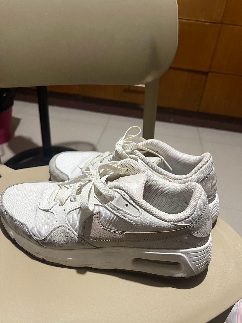 Nike Air Max SC White Sneakers (Category: Sneakers) located in Quezon City. Submitted by carmelaintal (Listing ID 1439863625, Image 3). Description: - Nike Air Max SC - Color: Sail, white upper with light brown swoosh and accents - Size: US 9 - Features white laces and midsole - Outsole: Light brown - Condition: Good.