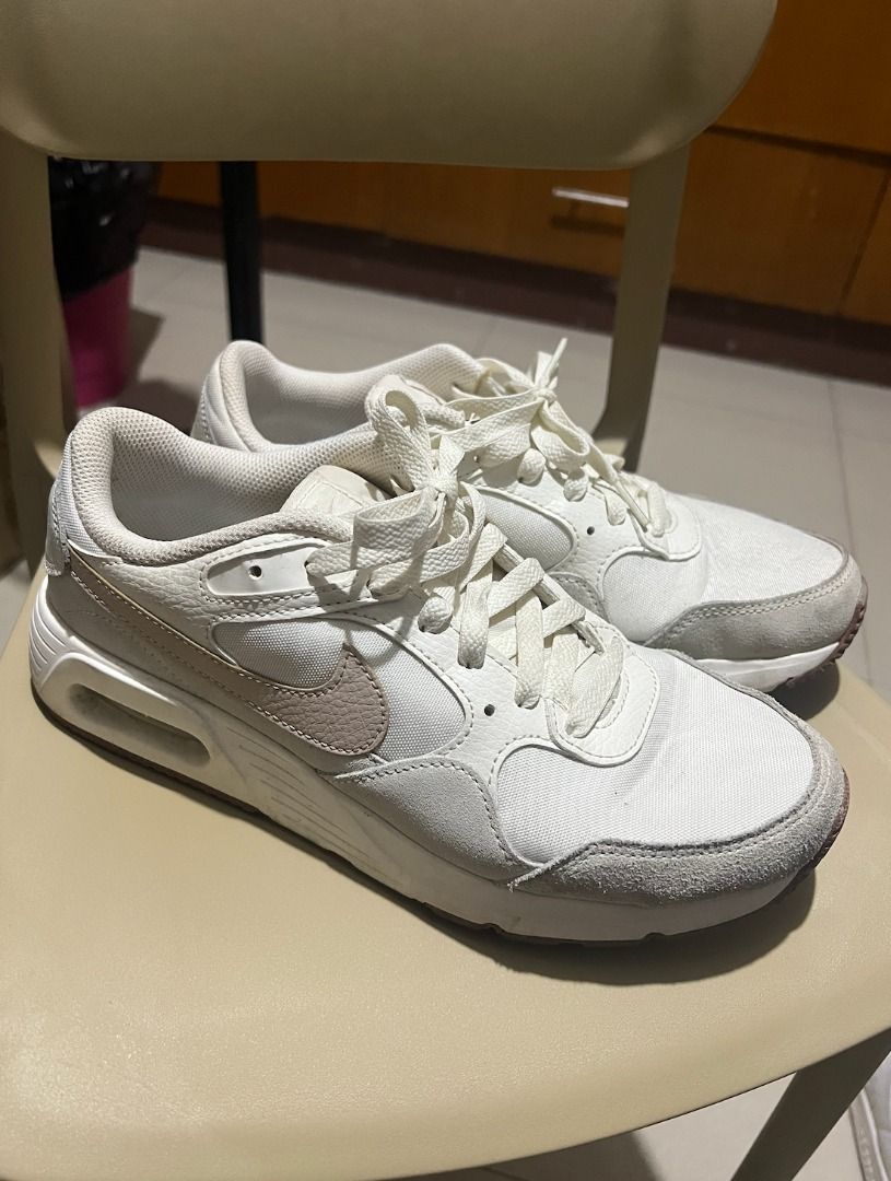 Nike Air Max SC White Sneakers (Category: Sneakers) located in Quezon City. Submitted by carmelaintal (Listing ID 1439863625, Image 1). Description: - Nike Air Max SC - Color: Sail, white upper with light brown swoosh and accents - Size: US 9 - Features white laces and midsole - Outsole: Light brown - Condition: Good.