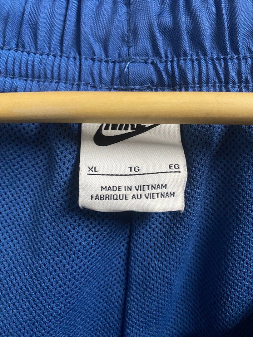 Nike Blue Athletic Shorts XL (Category: Shorts) located in Dagupan City. Submitted by junkfiles. (Listing ID 1439981955, Image 2). Description: - Comfortable and stylish blue Nike athletic shorts - Features a drawstring waist for a secure fit - Iconic Nike logo embroidered on the leg - Made in Vietnam - Perfect for workouts or casual wear.