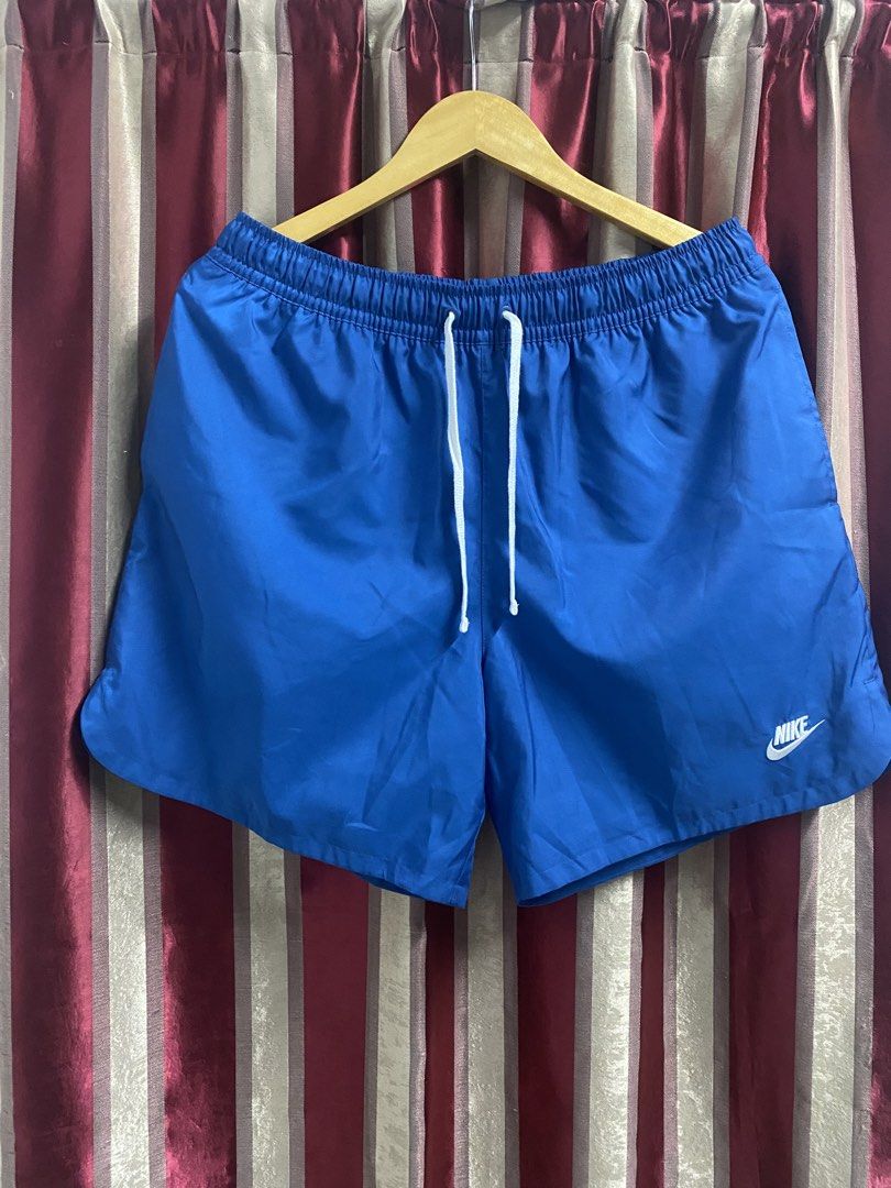 Nike Blue Athletic Shorts XL (Category: Shorts) located in Dagupan City. Submitted by junkfiles. (Listing ID 1439981955, Image 1). Description: - Comfortable and stylish blue Nike athletic shorts - Features a drawstring waist for a secure fit - Iconic Nike logo embroidered on the leg - Made in Vietnam - Perfect for workouts or casual wear.