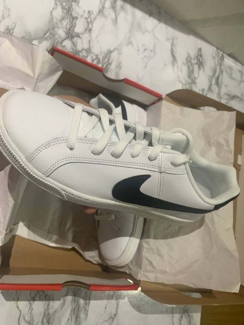 Nike Court Royale 2 NN (Category: Sneakers) located in Manila. Submitted by goldenlion-c7f9 (Listing ID 1439938194, Image 3). Description: Nike Court Royale 2 NN Colorway: White/Black Style Code: DH3160-101 • Size: EU 41 / CM 26 / UK 7 / BR 39.5 • Low-cut silhouette with classic lace-up closure • Synthetic leather upper for a clean and durable finish • Cushioned insole for everyday comfort • Rubber outsole with textured grip pattern • Lightweight