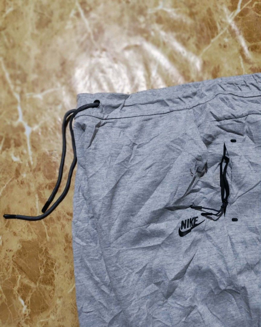 Nike Grey Jogger Pants (Category: Joggers) located in Sipalay. Submitted by boldowl.e4f283 (Listing ID 1439983542, Image 3). Description: - Comfortable grey Nike jogger pants - Adjustable drawstring waist - Features iconic Nike logo - Versatile for workouts or casual wear .