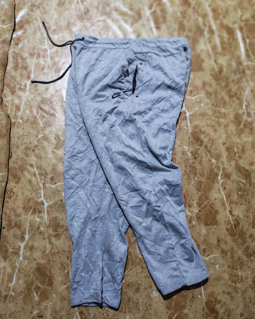 Nike Grey Jogger Pants (Category: Joggers) located in Sipalay. Submitted by boldowl.e4f283 (Listing ID 1439983542, Image 2). Description: - Comfortable grey Nike jogger pants - Adjustable drawstring waist - Features iconic Nike logo - Versatile for workouts or casual wear .