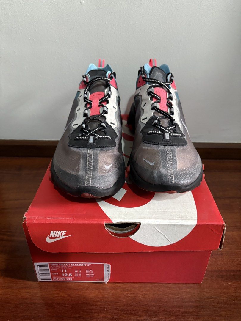 Nike React Element 87 AQ1090-006 (Category: Sneakers) located in Quezon City. Submitted by mendiolaj59846 (Listing ID 1439898088, Image 2). Description: - Authentic Nike React Element 87 sneakers - US Men's Size 11 - Features a translucent upper - Colorway: Black, blue, and pink - Includes original Nike box - Ideal for sneaker enthusiasts.