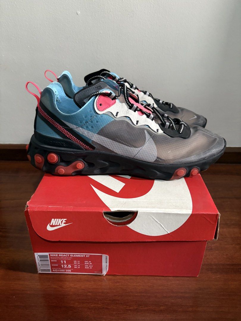 Nike React Element 87 AQ1090-006 (Category: Sneakers) located in Quezon City. Submitted by mendiolaj59846 (Listing ID 1439898088, Image 3). Description: - Authentic Nike React Element 87 sneakers - US Men's Size 11 - Features a translucent upper - Colorway: Black, blue, and pink - Includes original Nike box - Ideal for sneaker enthusiasts.