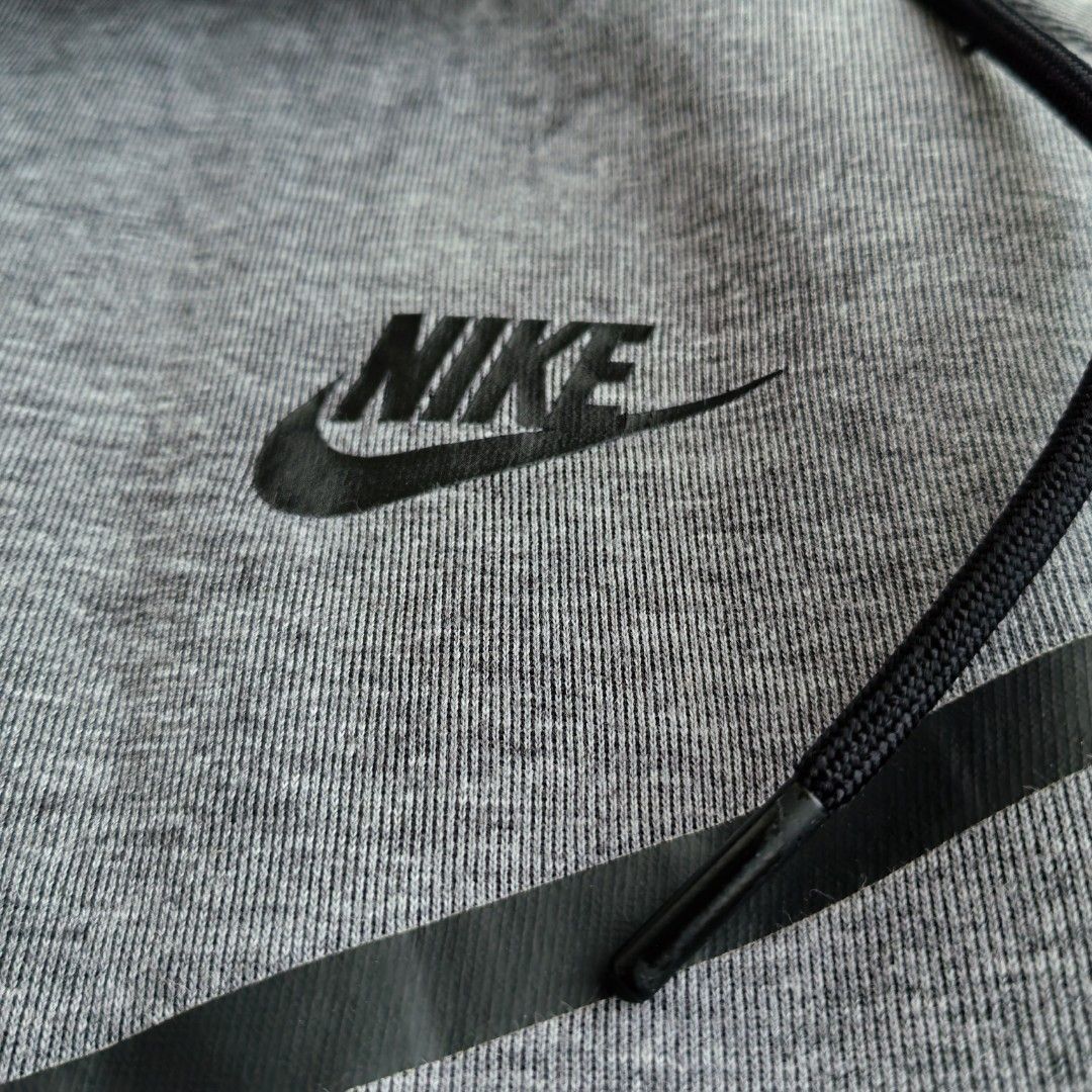 Nike Techfleece Double Zip Hoodie Jacket Gray (Category: Coats, Jackets and Outerwear) located in Pasig City. Submitted by j.ownerss (Listing ID 1439910484, Image 2). Description: FOR SALE‼️NIKE TECHFLEECE‼️ ₱600 ONLY (FROM 650) Full zip Double zip With pockets Condition: 8/10 Flaws: ribbings cut, scratches, fade inner hoodie (refer to last 3 slides) Dimensions: 23 x 24/26 Pickup: Allegra Garden Place Pasig Delivery via lalamove courier, strictly