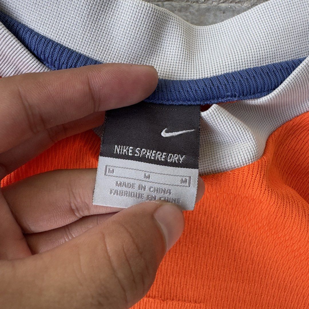 Nike Y2K Sphere dry t-shirt (Category: Tshirts & Polo Shirts ) located in Kalibo. Submitted by erwinjader81291 (Listing ID 1439851024, Image 2). Description: Size: Medium Dimension: 19.5” x 26.5” Issue: Loose stitch, dot stain Condition: 9/10 Color Rate: 10/10.