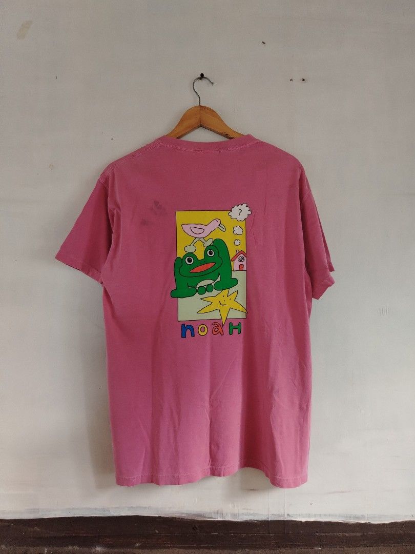 NOAH Frog Graphic Pink T-shirt (Category: Tshirts & Polo Shirts ) located in Tacloban City. Submitted by thrift500waray (Listing ID 1439979782, Image 2). Description: - Pink short-sleeved t-shirt - Chest pocket with 'frog' embroidery - Back graphic: frog, bird, star, house - NOAH logo on the back - Unique casual wear.