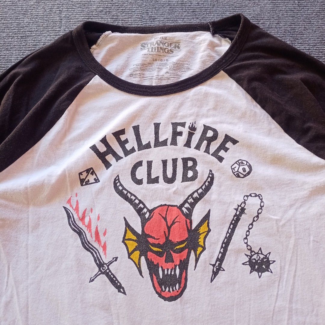 Official Stranger Things Hellfire Club Baseball Tee Shirt (Size L) (Category: Tshirts & Polo Shirts ) located in Jose Panganiban. Submitted by larapcity (Listing ID 1439925974, Image 2). Description: ✅ 450 + Shipping Fee (PAYMENT FIRST) ✅ Nasa pictures na po ang mga sukat ✅ Excellent condition, 9.9/10 color rate, Already washed, No issue ✅ MOP: GCash ✅ Meet up around Jose Panganiban area ✅ Shipping nationwide via J&T ✅ K2-150 ~~~ LOCATION: Camari