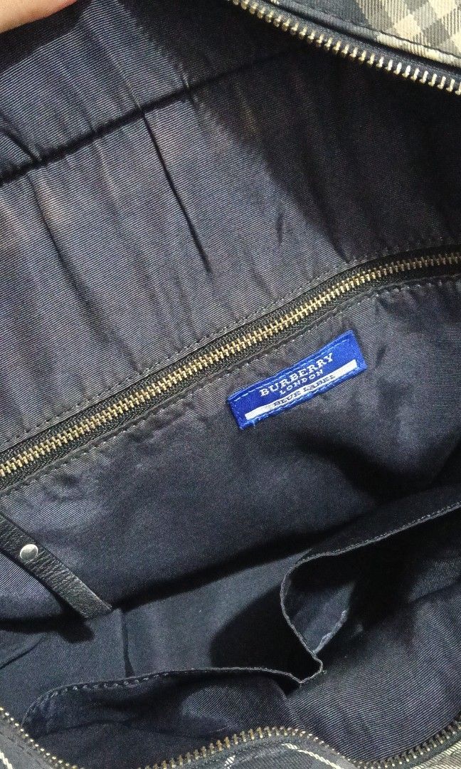 OG Burberry Blue Label Tote Bag (Category: Luxury Bags & Wallets) located in Manila. Submitted by trendyie100 (Listing ID 1439930245, Image 2). Description: Selling as is where is, OG Burberry Blue Label Tote Bag, Horse Logo, Canvas. Big capacity, with signs of usage and minimal flaws, nastock kasi sa di paggamit, still good in actual, napakatibay, just need cleaning/bag spa lang to look fresh and new again, if di maarte ready na for use, as is k
