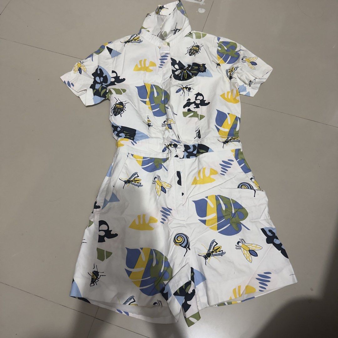 Cute Romper (Category: Jumpsuits) located in Quezon City. Submitted by pljdlrs (Listing ID 1439911112, Image 1). Description: - Cute and quirky short jumpsuit from PEACEBIRD STYLE. - Fun all-over print of insects and tropical leaves on a white background. - Features a collared neckline and short sleeves. - Ideal for casual outings or fun events..
