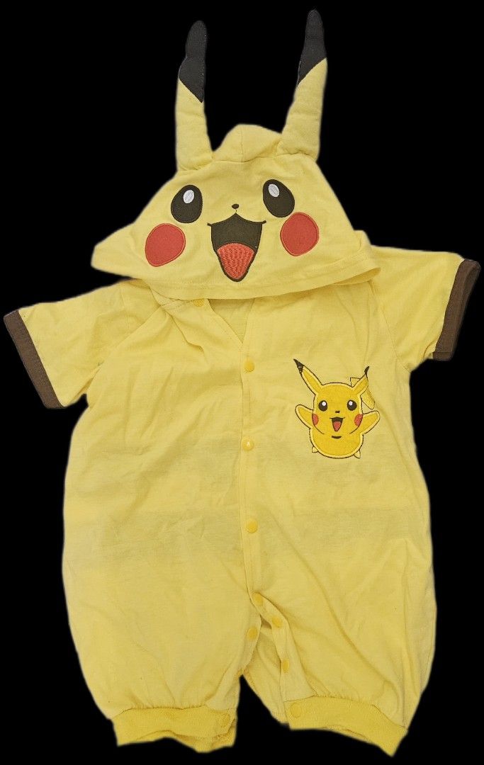 Pikachu Onesie Costume (1 - 2 years old) (Category: Babies & Kids Fashion) located in Makati City. Submitted by xzyche (Listing ID 1439844967, Image 1). Description: Adorable Pikachu onesie costume. Features a hood with Pikachu's face and ears. Includes a Pikachu graphic on the chest and a tail at the back. Designed with short sleeves and snap closures for easy wear. The onesie is yellow with brown accents. Perfect for cosplay or themed events..