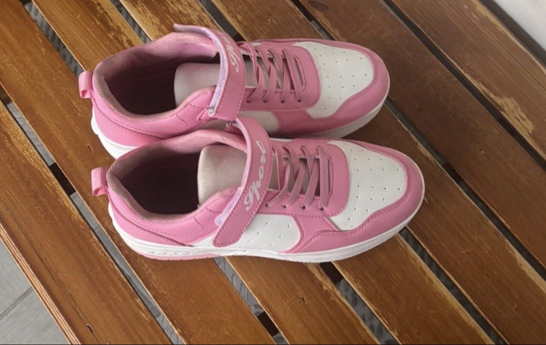 Pink and White Heelys Roller Shoes (Category: Sneakers) located in Paranaque City. Submitted by beautyandthriftfinds (Listing ID 1439970763, Image 1). Description: - Pink and white roller shoes - Secure velcro strap and lace-up closure - Integrated wheels for walking and rolling - Perfect for active and fun-loving kids Bought from tiktok. Used only a few times coz my daughter decided she wants roller blades instead. Insole is around 23cm coz my d