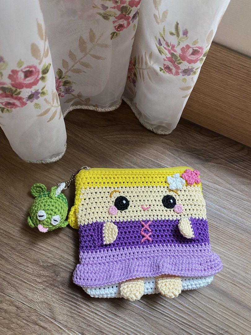 Pixie Dusting - Rapunzel Mini Pouch (Category: Handmade Craft) located in Singapore. Submitted by mrs.happy.shopping (Listing ID 1439897559, Image 1). Description: Mini Pouch about 10 cm height (12 cm length x 2 cm depth) Great gift for Pixie Dusting on your Disney Cruise trip. Unforgetable Gift 🎁 DM for more detail.