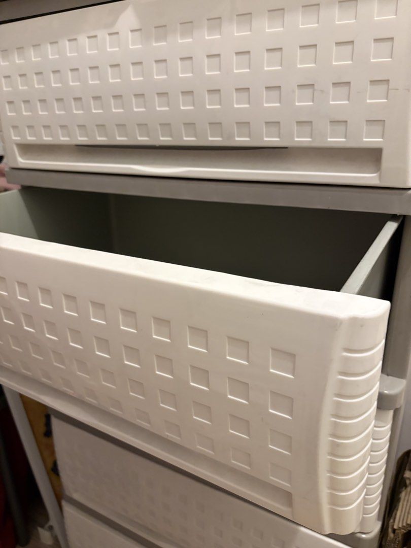 Plastic Drawer Storage Cabinet Organizer (Category: Shelves, Cabinets & Racks) located in Pasig City. Submitted by thea.sbalagtas (Listing ID 1439912038, Image 2). Description: - Multi-drawer plastic storage cabinet - Light beige with grey accents and textured front - Spacious and easy-to-open drawers - Ideal for organizing clothes, toys, and household items - Perfect for bedrooms, closets, or dorm rooms.