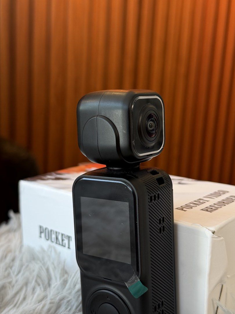 Pocket Dual Camera action camera (Category: Video Cameras) located in Bacolod City. Submitted by BWMCAROUSEL (Listing ID 1439959933, Image 3). Description: - Compact pocket video recorder for on-the-go adventures. - Rotatable camera head for flexible shooting angles. - Built-in screen for easy preview and playback. - Includes mounting accessories for versatile attachment. - Ideal for capturing moments wherever you are..