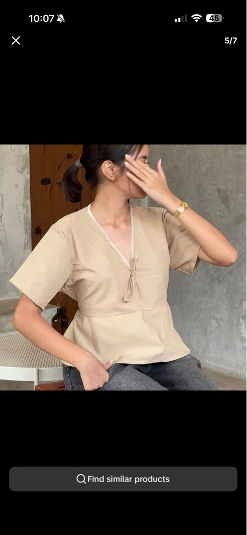 Polin Linen Top Peplum (Category: Blouses) located in Quezon City. Submitted by luv.uhli (Listing ID 1439950376, Image 1). Description: - Brand: Polin - Style: Linen Top Peplum - Color: Khaki - Neckline: V-neck with delicate white trim - Features: Front tie detail, peplum silhouette - Sleeves: Short sleeves - Material: Linen - Fit: Versatile, fits XS to XL.