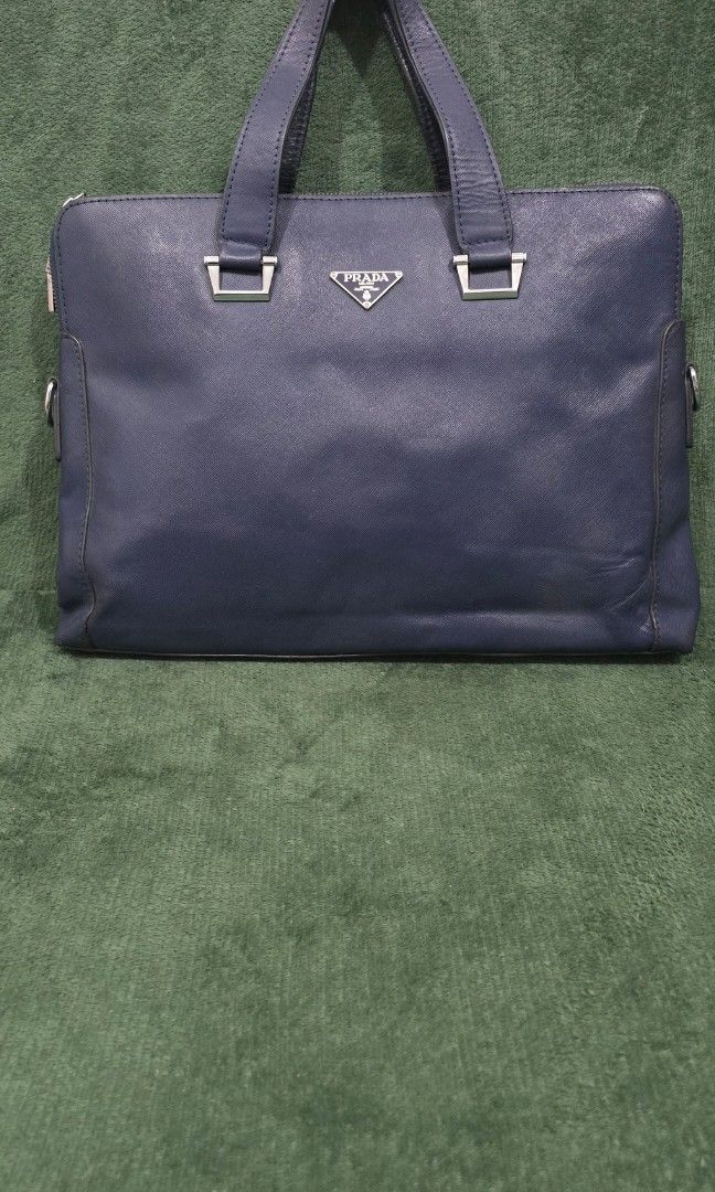 Prada Saffiano Briefcase (Category: Luxury Bags & Wallets) located in Bacoor. Submitted by deux_trading_corporation (Listing ID 1439950991, Image 1). Description: Rank A - with normal signs of use pm your tawad..
