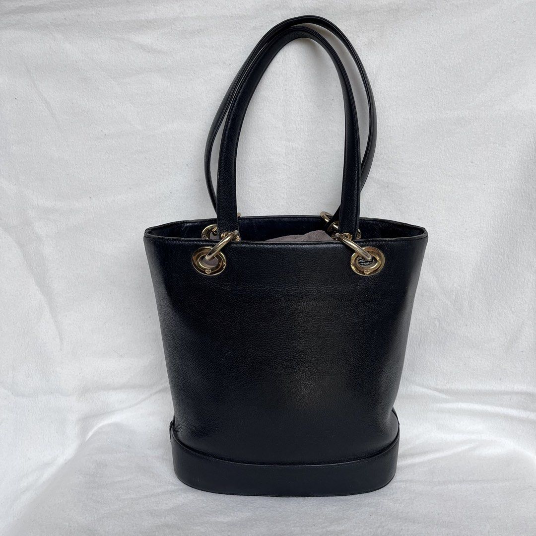 Preloved MCM Black Bucket Tote (Category: Luxury Bags & Wallets) located in Zamboanga. Submitted by shop.radandfab (Listing ID 1439955505, Image 3). Description: Preloved MCM Black Bucket Tote With signs of usage( minimal scuffs and peelings) but still in good conndition .