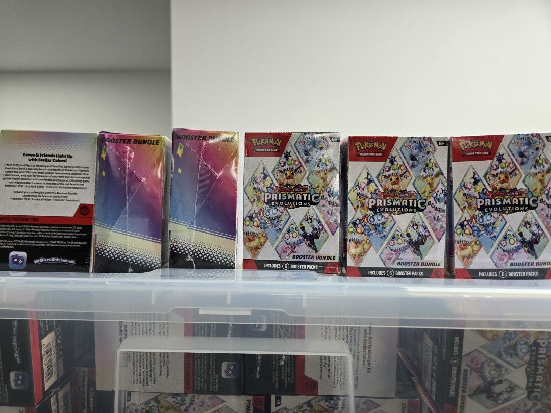 Prismatic Evolution booster bundle (Category: Card Boxes & Cases) located in Singapore. Submitted by alansng84 (Listing ID 1439947154, Image 2). Description: Prismatic Evolution booster bundle! Good for chasing cards or keep as collectible! consist of 6 booster pack!.