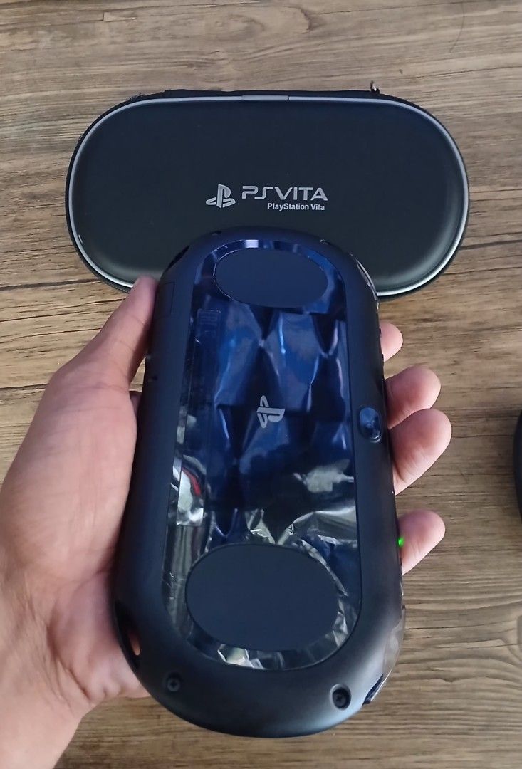 PS VITA SLIM PIANO BLACK (Category: PlayStation) located in Paranaque City. Submitted by gideon_dawn (Listing ID 1439820091, Image 3). Description: PS VITA SLIM PIANO BLACK ● CONDITION - ALL BUTTON 100% - LEFT AND RIGHT ANALOG 100% - FRONT AND REAR SCREEN 100% - CAMERA FRONT AND REAR 100% - WIFI CONNECTIVITY - SPEAKER 100% - LCD 80% - JAIL BROKEN (HENKAKU) - READY TO PLAY (UNLI DOWNLOAD) ● INCLUSION - POUCH - HAND GRIP - JELLY CASE - CHARGER - IN