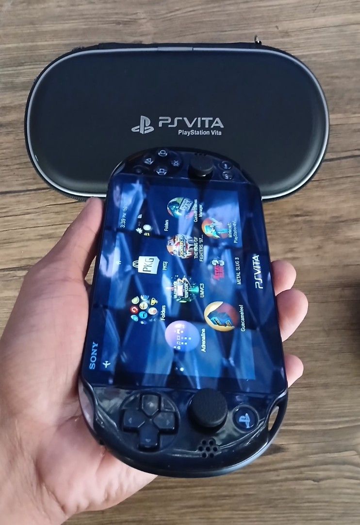 PS VITA SLIM PIANO BLACK (Category: PlayStation) located in Paranaque City. Submitted by gideon_dawn (Listing ID 1439820091, Image 2). Description: PS VITA SLIM PIANO BLACK ● CONDITION - ALL BUTTON 100% - LEFT AND RIGHT ANALOG 100% - FRONT AND REAR SCREEN 100% - CAMERA FRONT AND REAR 100% - WIFI CONNECTIVITY - SPEAKER 100% - LCD 80% - JAIL BROKEN (HENKAKU) - READY TO PLAY (UNLI DOWNLOAD) ● INCLUSION - POUCH - HAND GRIP - JELLY CASE - CHARGER - IN