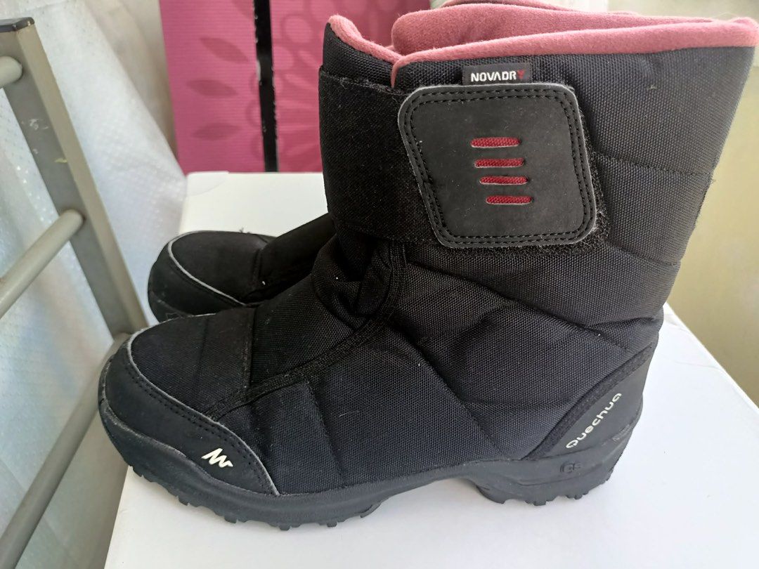 Quechua Novadry Black Winter Boots (Category: Boots) located in Dasmarinas. Submitted by gelxto (Listing ID 1439991732, Image 2). Description: - Durable black winter boots from Quechua - Warm pink lining for comfort - Adjustable velcro straps for a secure fit - Novadry technology for water resistance - Ideal for cold weather adventures.