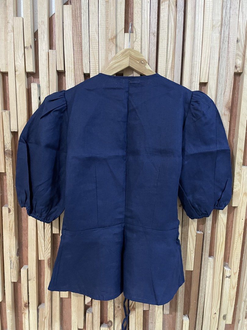 Reformation Tie On Linen blouse (Category: Blouses) located in Mabalacat. Submitted by sabinascloset.cleanout (Listing ID 1439916959, Image 2). Description: Color is navy blue , linen material Size: xs.