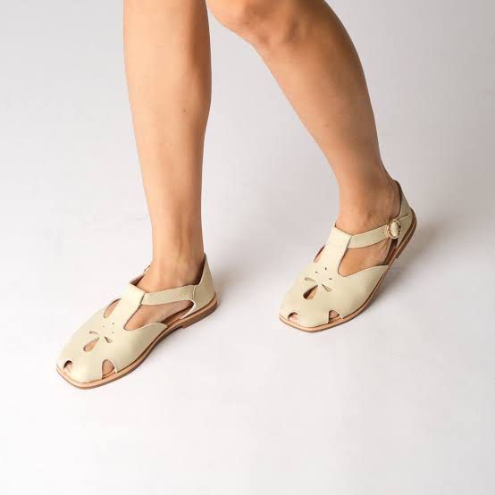 Renegade Folk Leather Sandals - Size 10 (Category: Flats & Sandals) located in Quezon City. Submitted by juvyjuvydoo (Listing ID 1439822778, Image 1). Description: - Renegade Folk sandals - Size 10 (may fit size 9 if feet is wide) - Unique cut-out design - T-strap style - Buckle closure - Light cream color - Light brown soles - Leather upper Unused.