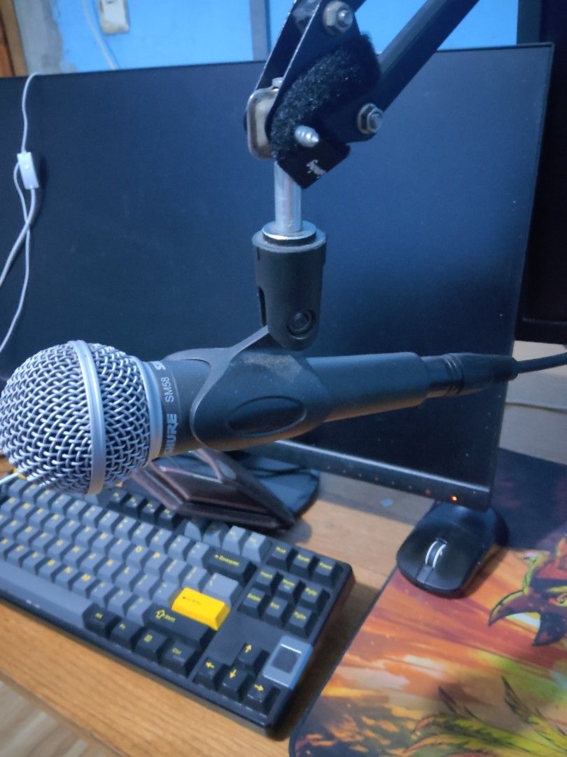 Shure SM58 Microphone (Category: Microphones) located in Manila. Submitted by sh4riii (Listing ID 1439859660, Image 1). Description: - Shure SM58 dynamic vocal microphone - Includes tehyun q12 interface - Delivers clear and reliable sound - Perfect for vocals and instruments.