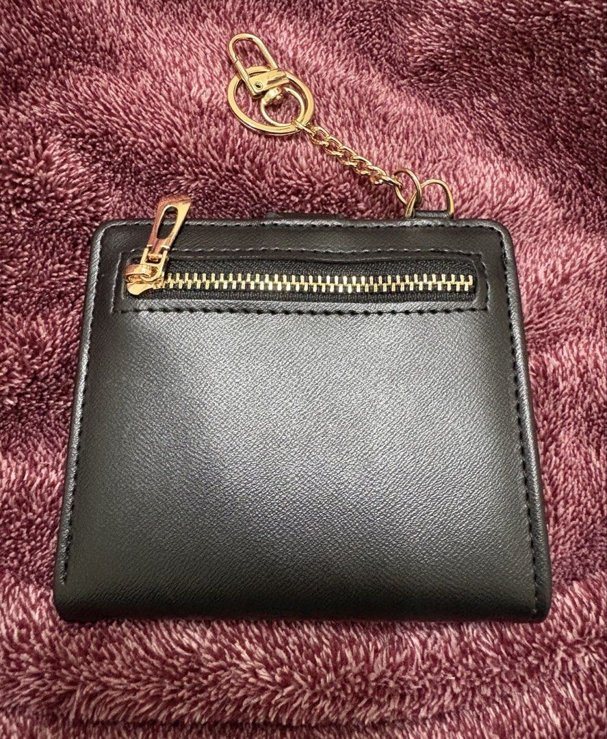 Slim black wallet (Category: Wallets & Card holders) located in Manila. Submitted by cyaneaco (Listing ID 1439913763, Image 2). Description: Once ko lng nagamit ang liit kasi .