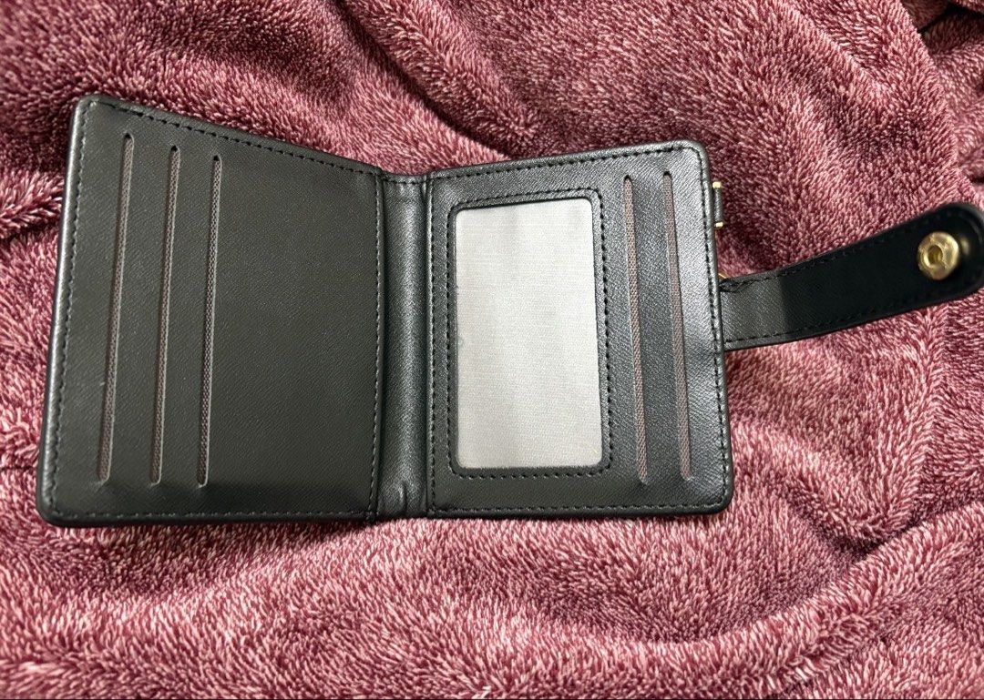 Slim black wallet (Category: Wallets & Card holders) located in Manila. Submitted by cyaneaco (Listing ID 1439913763, Image 3). Description: Once ko lng nagamit ang liit kasi .