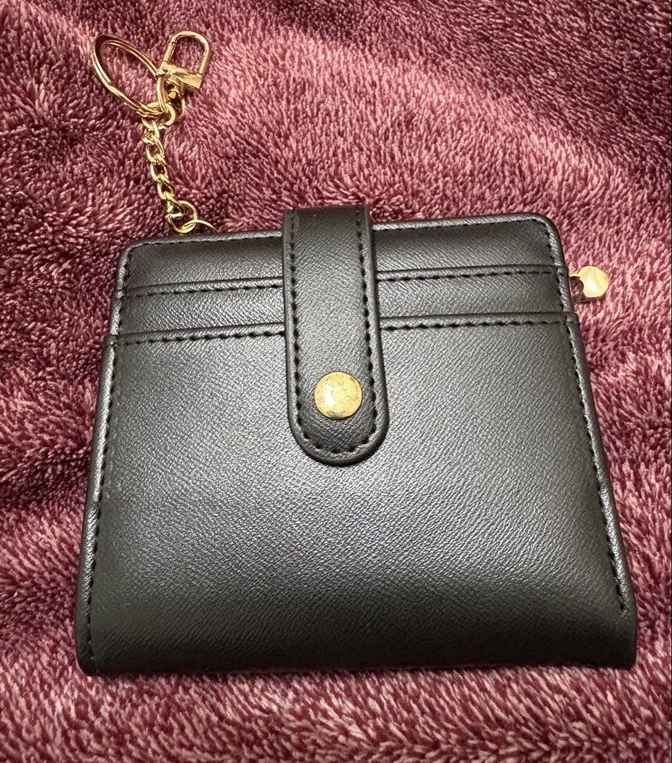 Slim black wallet (Category: Wallets & Card holders) located in Manila. Submitted by cyaneaco (Listing ID 1439913763, Image 1). Description: Once ko lng nagamit ang liit kasi .
