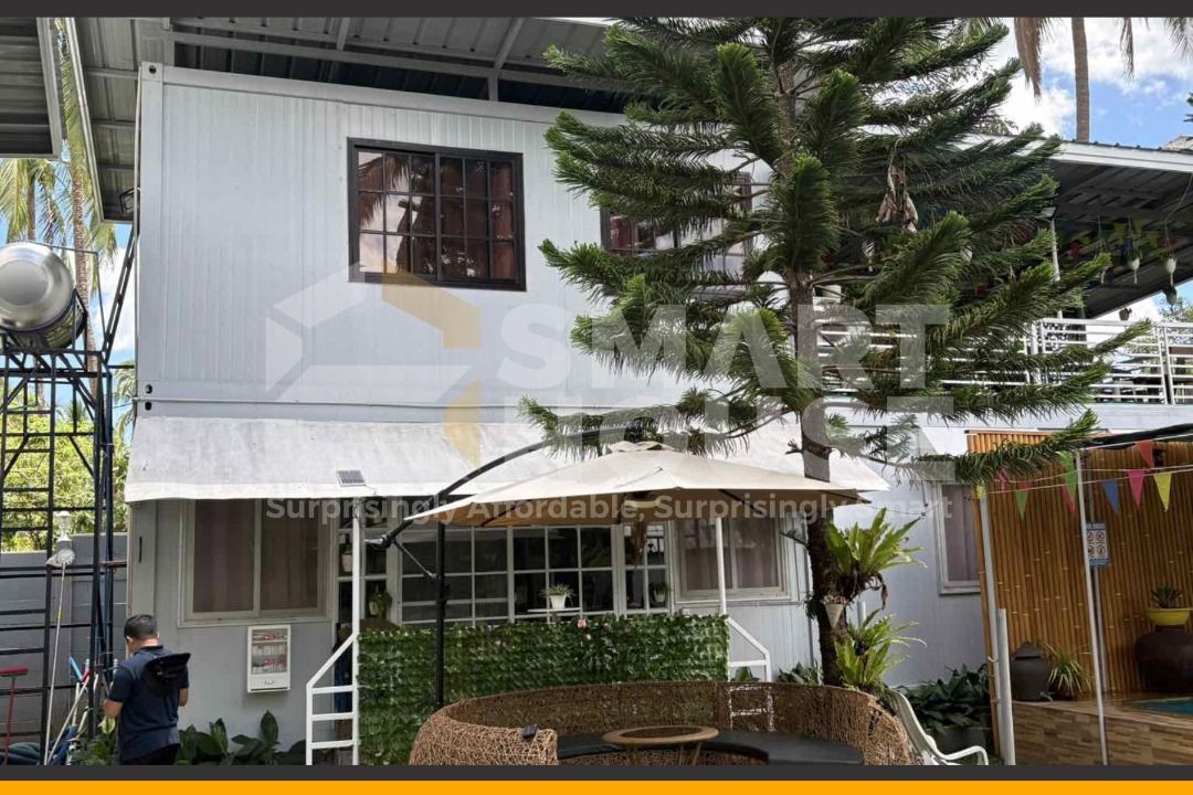 SMARTHOUSE PREFAB CONTAINER RESORT (Category: Construction & Building Materials) located in Quezon City. Submitted by Smarthouseph (Listing ID 1439864064, Image 3). Description: Akala mo traditional build lang ang kayang gumawa ng ganitong resort vibes? 👀🌿 This stunning resort project in Alfonso, Cavite is built with Smarthouse Prefab Container Solutions — modern, mas mura, mabilis gawin, at resort-ready agad. Perfect for staycations, resorts, 