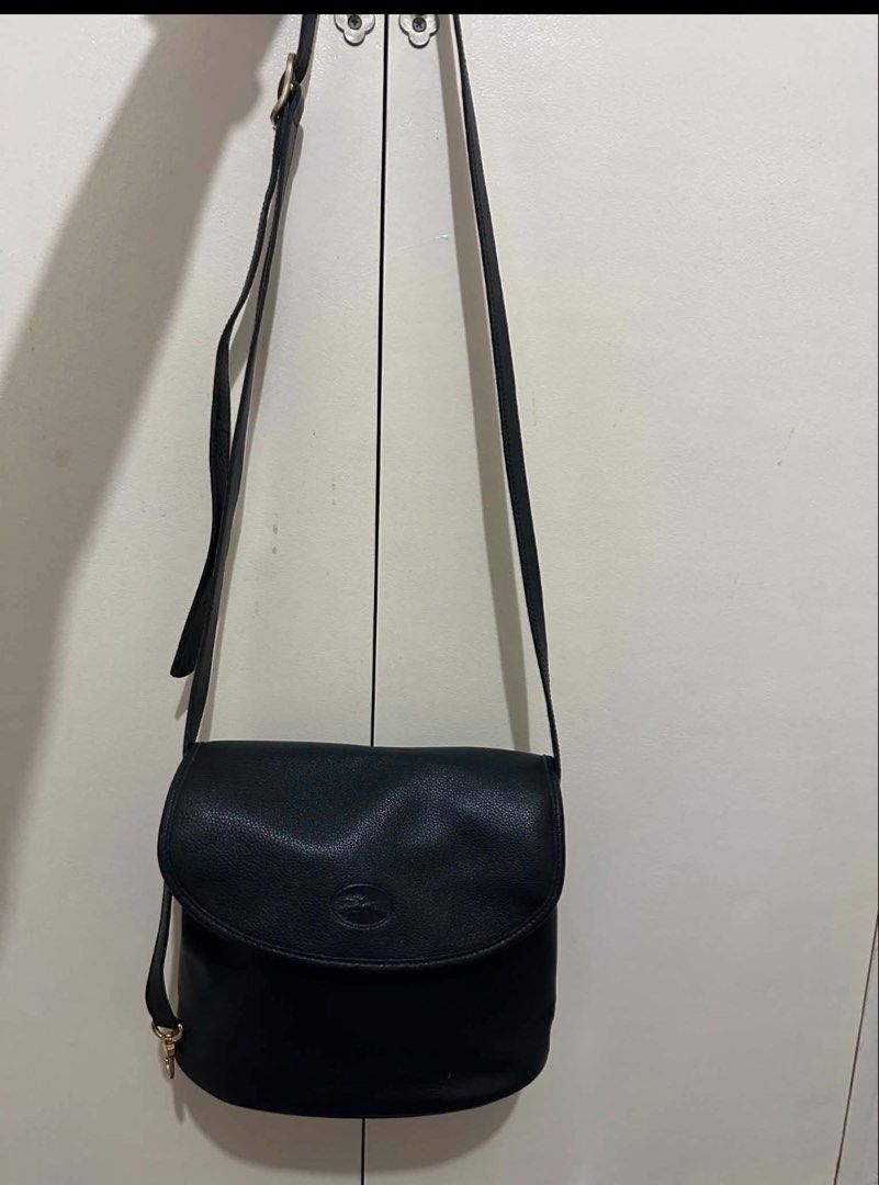 SOLD ✨Thank you (Category: Backpacks) located in Cebu City. Submitted by shopnsave2015 (Listing ID 1439855596, Image 2). Description: - Genuine Bally backpack - Classic black leather - Convenient front zippered pocket - Top handle for easy carrying - Secure main compartment with zipper - Iconic Bally logo detail.