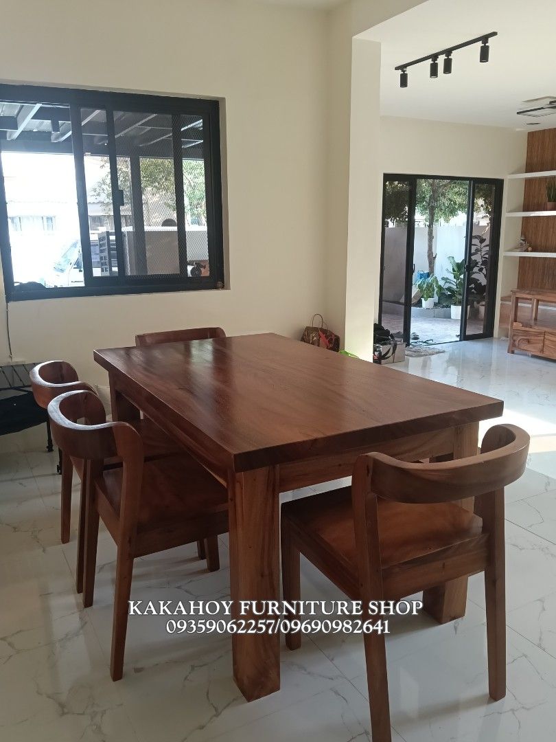 Solid Wood Dining Table with Chairs and Bench (Category: Tables & Sets) located in Manila. Submitted by acasya123 (Listing ID 1439964003, Image 3). Description: - Solid wood dining set - Includes: 1 rectangular table, 4 chairs with curved backs, 1 long bench - Rich wood grain for warmth and elegance - Sturdy construction for durability - Natural and timeless aesthetic.