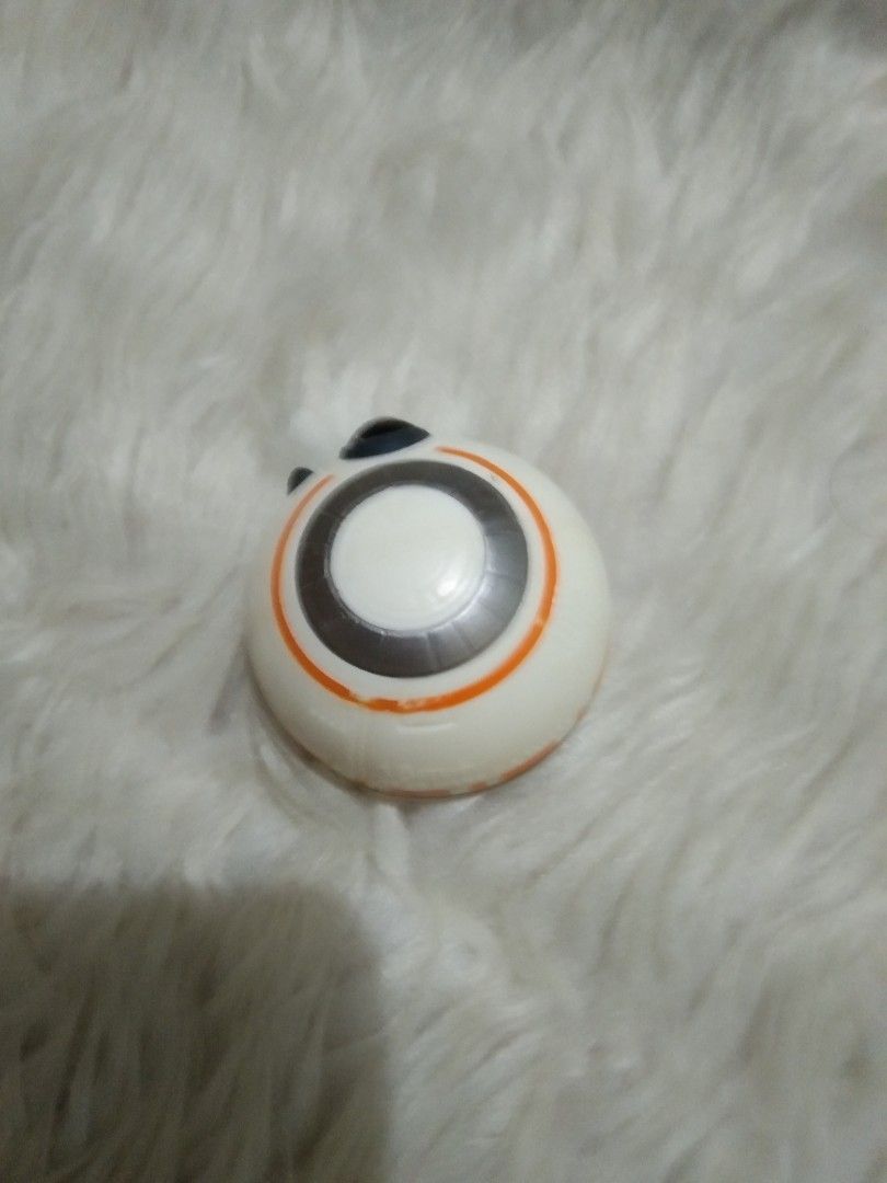 Star Wars BB-8 Mini Toy (Category: Character Goods) located in Quezon City. Submitted by eidorableshop (Listing ID 1439961607, Image 2). Description: - Mini BB-8 toy from the Star Wars franchise. - Features the classic white, orange, and black design. - Includes a compartment at the bottom, ideal for batteries or small items. - A must-have for any Star Wars enthusiast or collector..
