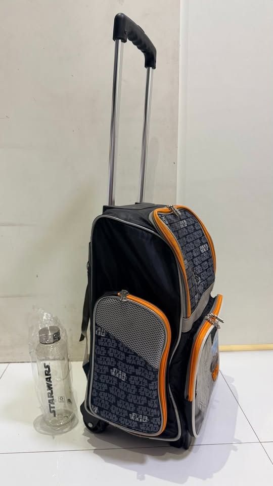 Star Wars Millennium Falcon Rolling Backpack with Water Bottle (Category: Backpacks) located in Taytay. Submitted by taytaycomputeronlinestore (Listing ID 1439974642, Image 2). Description: 🚀 FOR SALE: Preloved Star Wars Trolley School Bag 🚀 Original Price 4,000 SM Taytay For sale Only 999 For sale Only 999 Perfect for young Jedi fans! This awesome Star Wars trolley backpack features the legendary Millennium Falcon design with spacious compartm
